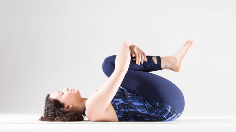 practicing-knees-to-chest-for-a-grounding-sequence