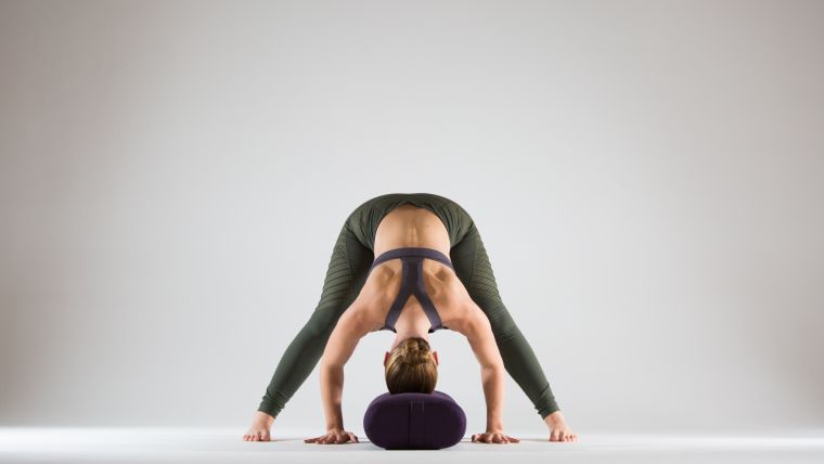 inversion-prep-wide-legged-forward-fold-with-bolster