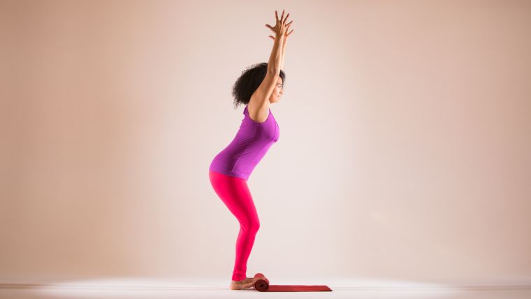 Rolled-up Yoga Mat in Practice