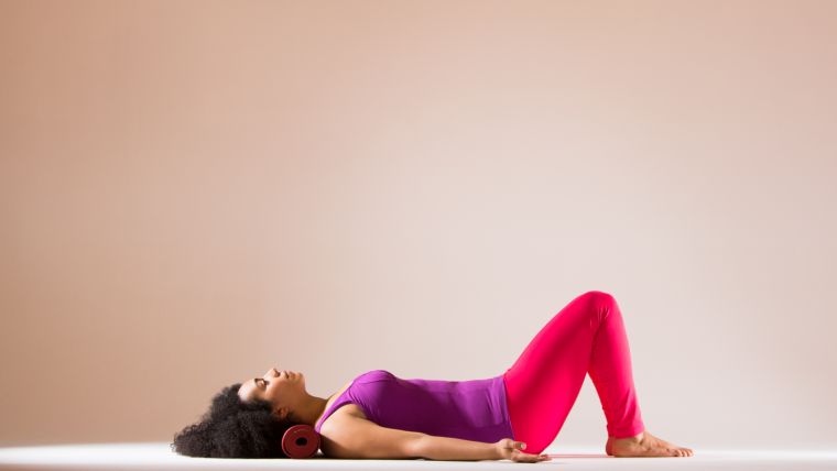 Rolled-up Yoga Mat in Practice