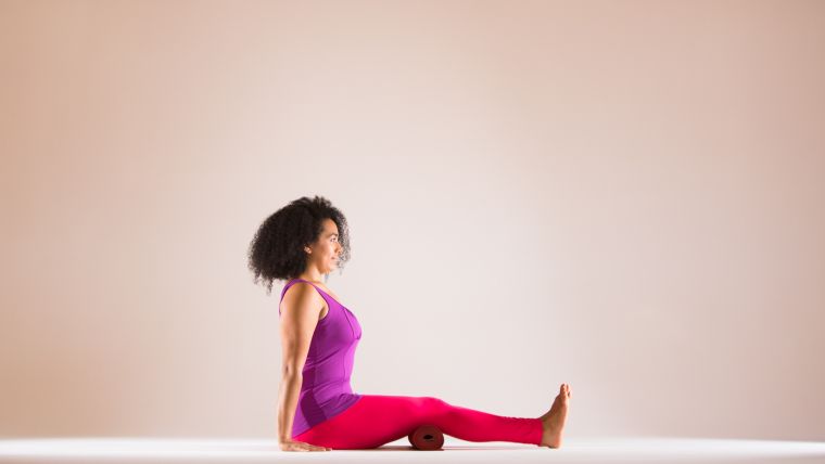 Rolled-up Yoga Mat in Practice