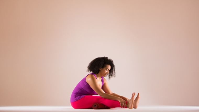 Rolled-up Yoga Mat in Practice