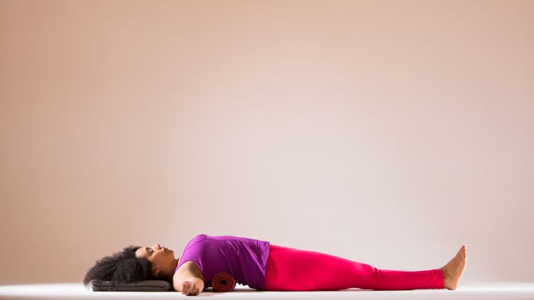 Rolled-up Yoga Mat in Practice