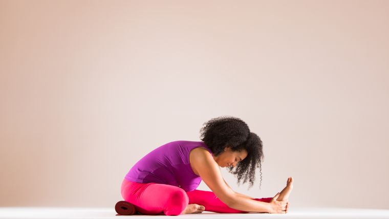 Rolled-up Yoga Mat in Practice