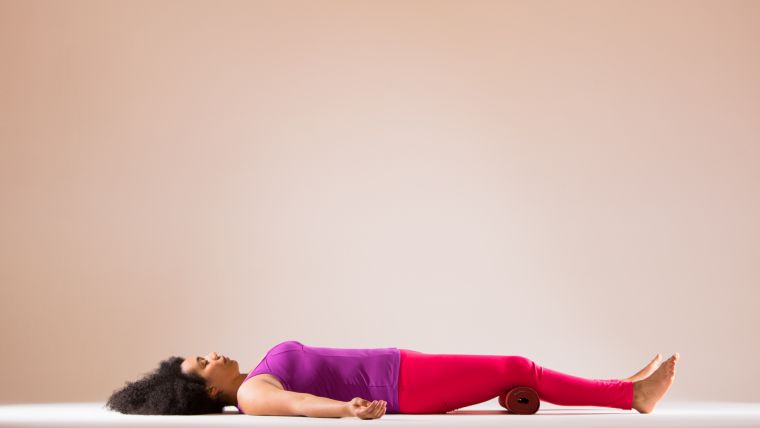 Rolled-up Yoga Mat in Practice