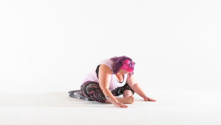 yin-yoga-forward-fold-with-toe-stretch